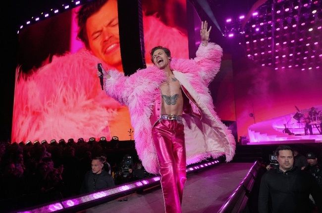 Harry Styles rocked a pink custom Gucci coat when he performed at the Coachella Valley Music and Arts Festival earlier this year. (PHOTO: Gallo Images / Getty Images)