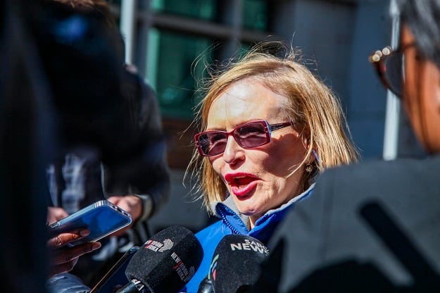 Helen Zille address the media during a protest outside the basic education dept's offices on Tuesday. 