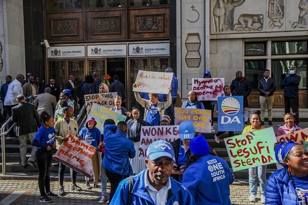 DA supporters protest outside the education offices in Joburg on Tuesday. 
