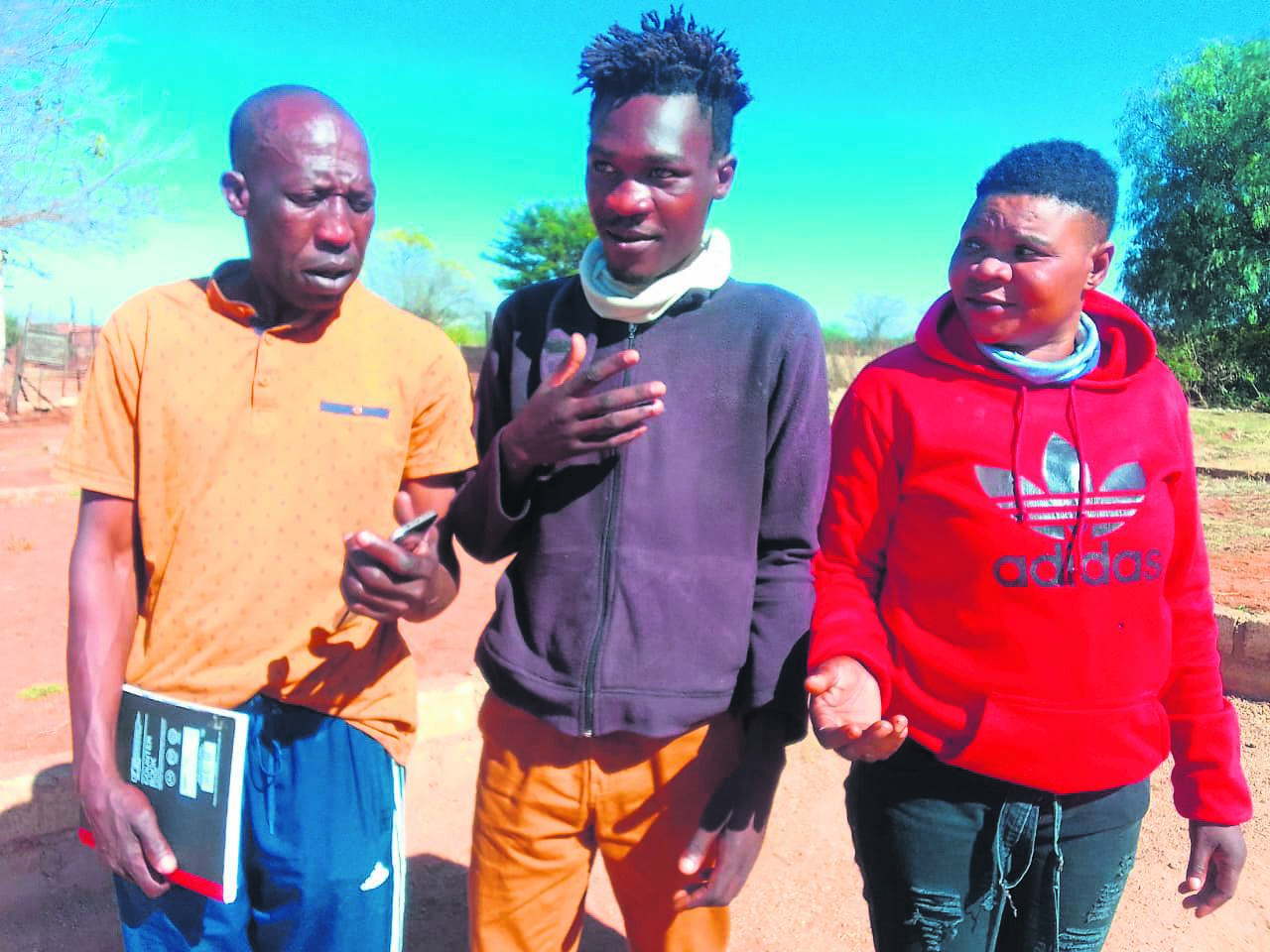 Jacob Mabula and Joyce Ngobeni said they want their money back after their son, Thabang Ngobeni (centre), went to and allegedly paid a sangoma for an initiation that didn’t go as planned.              Photo by Raymond Morare