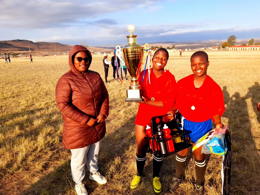 From left are, Anele Somagaca (The Female World Foundation Director), Kwezi Ladies players, Thandokazi Moni (captain) and Mihlali Somi.