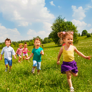 Kids running in a field