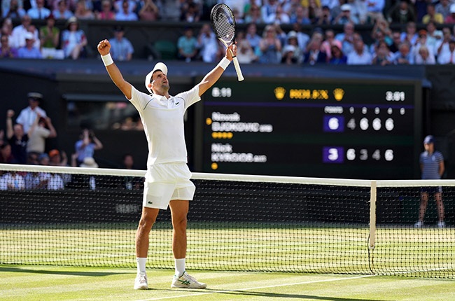 Novak Djokovic celebrates beating Nick Kyrgios to win his seventh Wimbledon title. (Photo by Zac Goodwin/PA Images via Getty Images)
