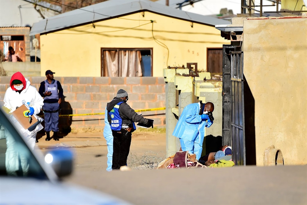 Residents of Lahlumlenze in Orlando East are still in disbelief of what happened at a local tavern. 15 people were shot and killed while 9 were injured, three of them being in a critical condition. Photo by Christopher Moagi