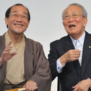 Kazuo Inamori (right), Founder of Kyocera and Tokyo mayor Daisaku Kadokawa share a smile. (File: Kazuhiro Nogi, AFP)