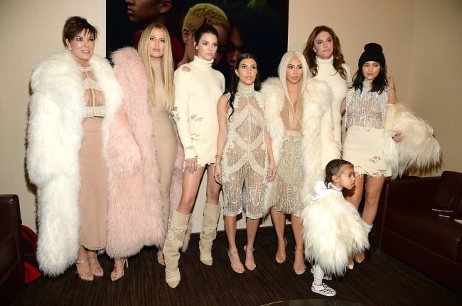 Kris Jenner, Khloé Kardashian, Kendall Jenner, Kourtney Kardashian, Kim Kardashian, Caitlyn Jenner, North West and Kylie Jenner at a Kanye West Yeezy Season 3 show back in 2016. (PHOTO: Gallo Images/Getty Images) 