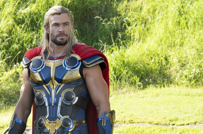 Chris Hemsworth is no novice when it comes to playing a god. In Thor: Love and Thunder he reprises his most well-known role as the God of Thunder. (PHOTO: Walt Disney Studios Motion Pictures)