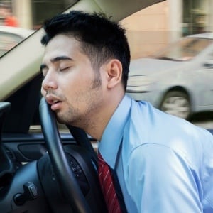 Asleep behind wheel – iStock
