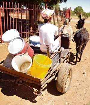 Residents of Itsoseng have to make numerous trips to the township’s communal tap. Picture: Elizabeth Sejake
