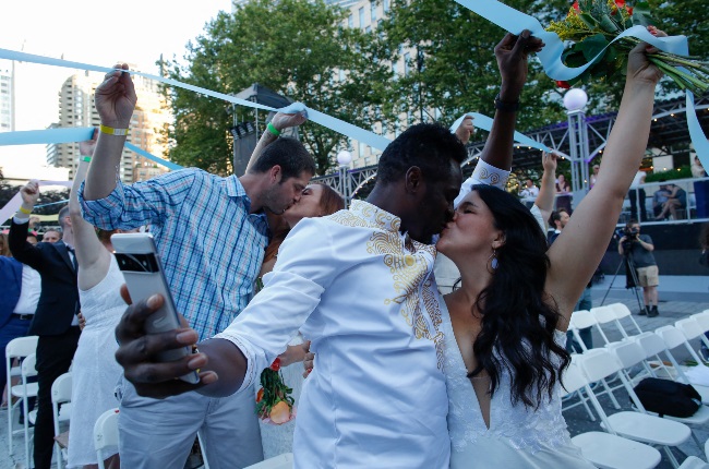 Couples whose weddings were affected by the Covid-19 pandemic recently participated in a symbolic multicultural ceremony. (PHOTO: Gallo Images / Getty Images)