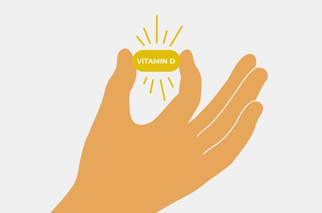Human hand holding vitamin D pill. Healthcare, cure, treatment concept. Female or male fingers show yellow medical drug with sun rays. Self, health care. Prevention deficit vitamin vector illustration