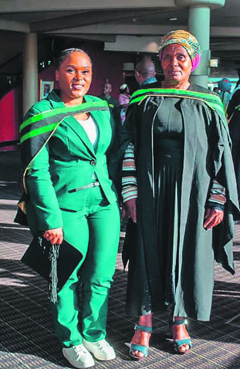 Sthokozo Mpisane shares her graduation gown with her gogo, Bathini Danca. 