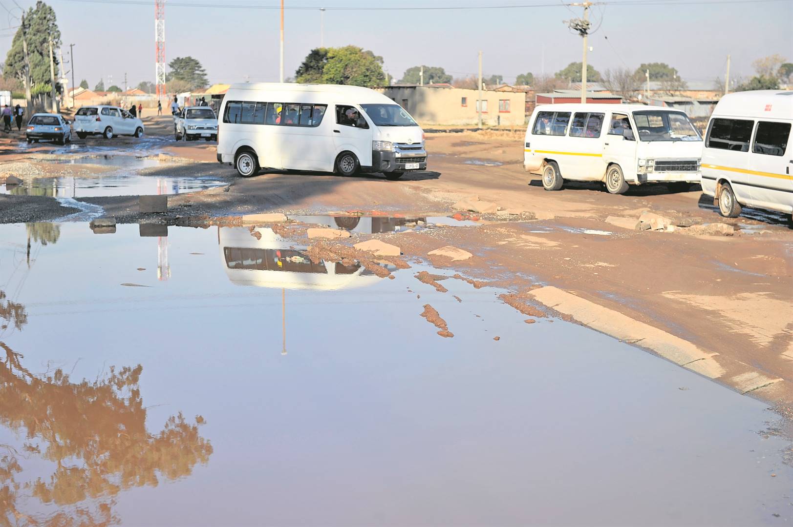 Motorists at Selbourne in the Vaal are forced to drive on this pothole-riddled road every day.                                      Photo by Jabu Kumalo