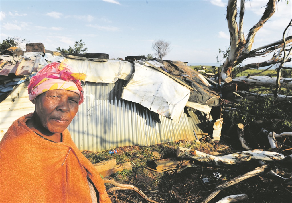 Susan Moacwi blames the area’s councillor after the branches of a tree damaged her shack.                  Photo by Lucky Morajane 