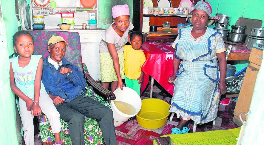 This family blames a demon animal for their string of bad luck.  Photo by Chris Qwazi 