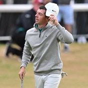 McIlroy gallops to share of lead as St Andrews' famous 17th bares its teeth