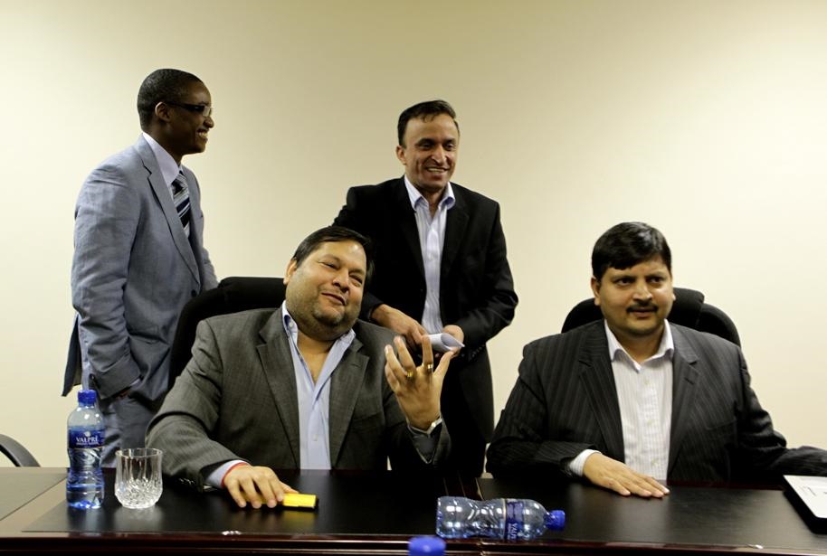 Ajay (left) and Atul Gupta with Duduzani Zuma and Jagdish Parekh (standing) at the New Age offices recently. Photo by Muntu Vilakazi