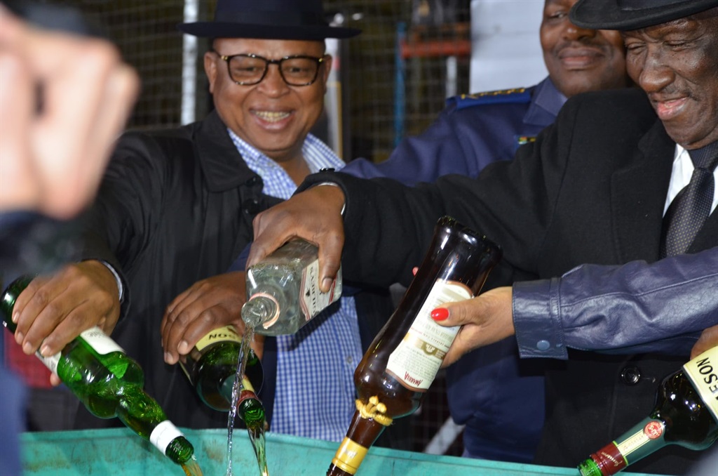 Minister of Police Bheki Cele disposed booze that was confiscated by officers around Cape Town in the past six months. Photos by Lulekwa Mbadamane