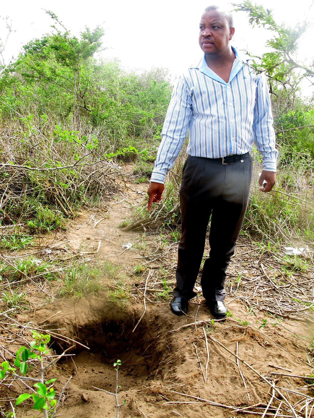 This is the shallow grave where the woman head was found in the inyanga’s home and izinyanga want to end these kinds of incidents.  Photo supplied by SAPS. 