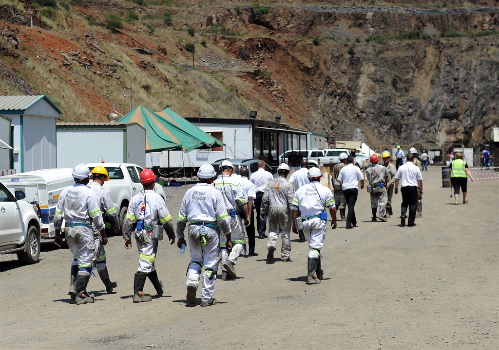 Search and rescue team members near the collapsed part of the Lily Mine. Picture: Felix Dlangamandla
