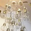 Upcycle that old lamp shade into an amazing light bulb chandelier