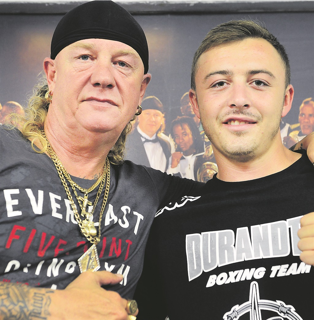 Boxing trainer and manager Nick Durandt with his eldest son, Damien. Picture: Leon Sadiki 