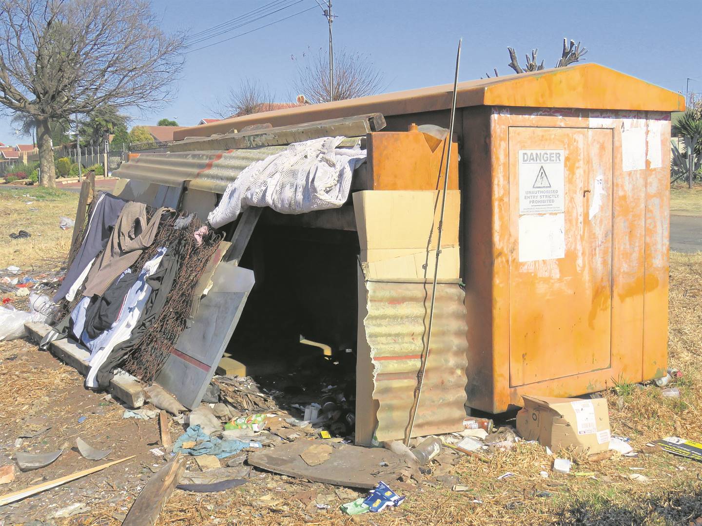 Residents of Bakerton are worried about a homeless man who has made a home next to a transformer.                Photo by Ntebatse Masipa