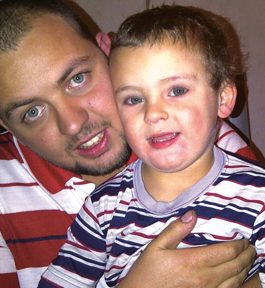 Donovan van Zyl was the driver of the white Toyota in an accident that claimed three lives. Here he is with his son, Riaan   