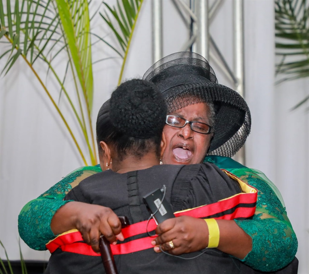 Nontokozo Ntuli and her mother hugging