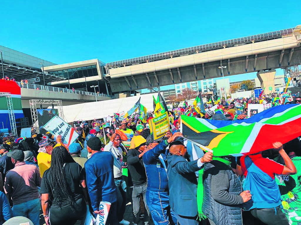 Football fans converged at the OR Tambo airport to welcome Banyana Banyana back from Morocco. Photo: Samuel Shivambu/BackpagePix