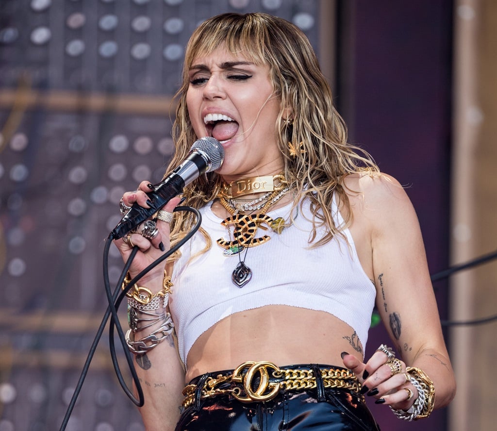 GLASTONBURY, ENGLAND - JUNE 30: Miley Cyrus performs on the Pyramid stage on day five of Glastonbury Festival at Worthy Farm, Pilton on June 30, 2019 in Glastonbury, England.