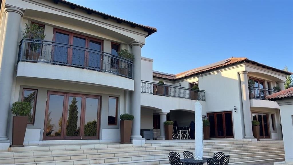 This double-storey house is one of the properties belonging to several people implicated in the multimillion rand 'blue lights' tender - including former acting national police commissioner Khomotso Phahlane and former deputy national police commissioner Bonang Mgwenya - seized following a court order.