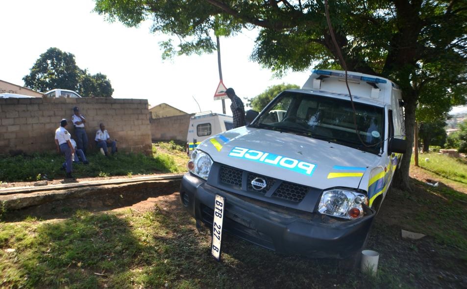 There was chaos when a flying, naked woman allegedly tried to hijack a cop van in KwaMashu, north of Durban yesterday. She veered off the road and hit a water meter. Photos by Abraham Kortjaas