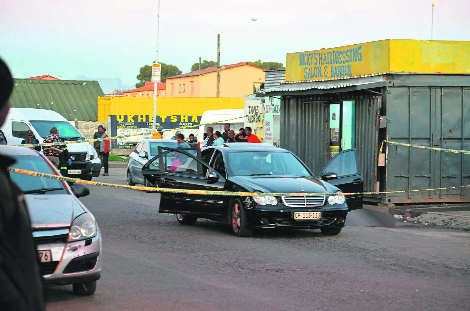 Two men were gunned down while seated in a parked car in Nyanga. Photo by Lulekwa Mbadamane