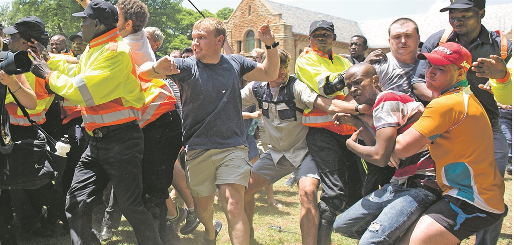 WAR AND PRAYER English- and Afrikaans-speaking students clash after violence breaks out on the main campus of the University of Pretoria. The English-speaking students were protesting against the use of Afrikaans as a medium of instruction at the university.  Picture: Deaan Vivier / foto24 / NUUS NOORD  