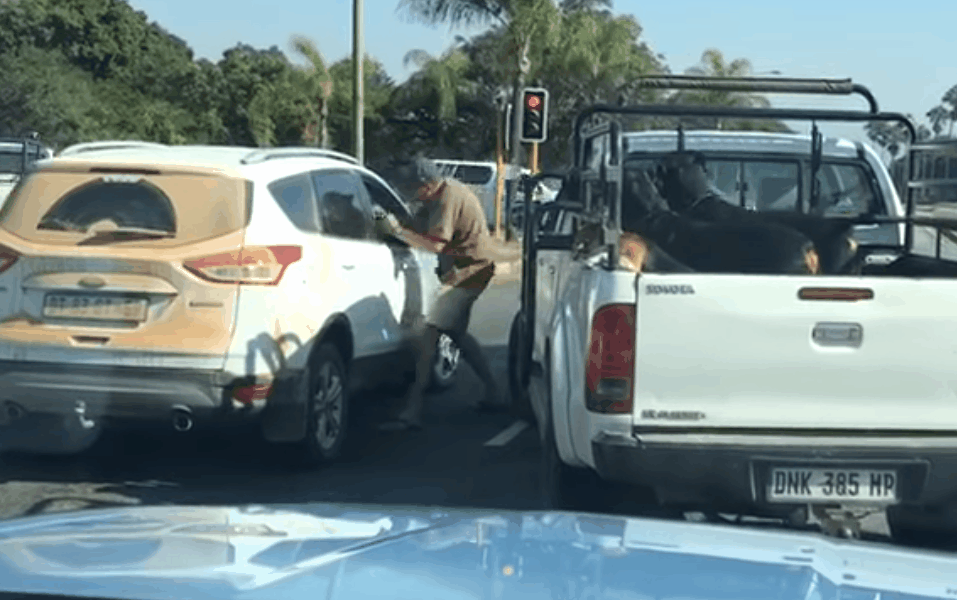 <b> FISTICUFFS: </b> A man assaults the driver of a Ford Kuga at an intersection in Mbombela. It's not clear what sparked the altercation.  <i> Image: Youtube </i>