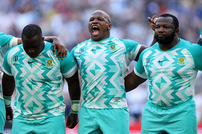 Trevor Nyakane, Bongi Mbonambi and Ox Nche sing South Africa’s national prior to their match against Scotland in Marseille. (Photo by Cameron Spencer/Getty Images)