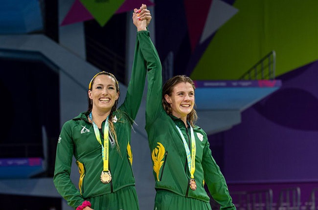 South Africa's Tatjana Schoenmaker and Kaylene Corbett medal at the Commonwealth Games