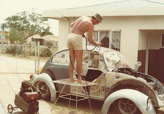 Koos Fleming respraying their 1976 VW Beetle in th