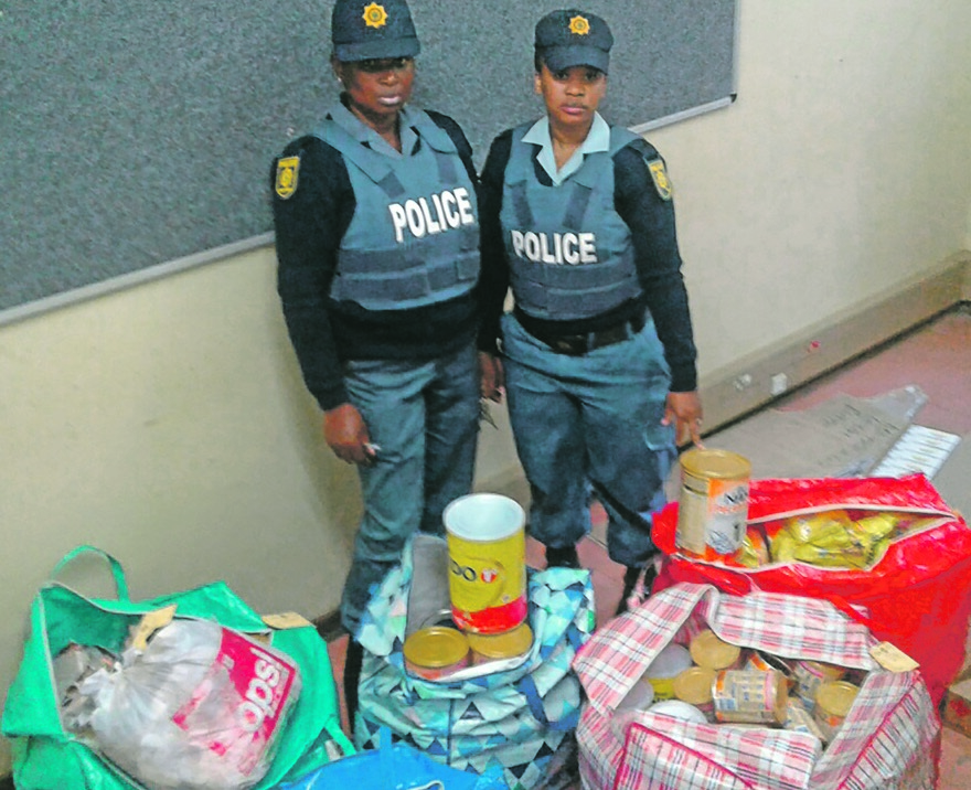 From left: Police recovered R32 000 worth of baby formula from three suspects on Saturday.