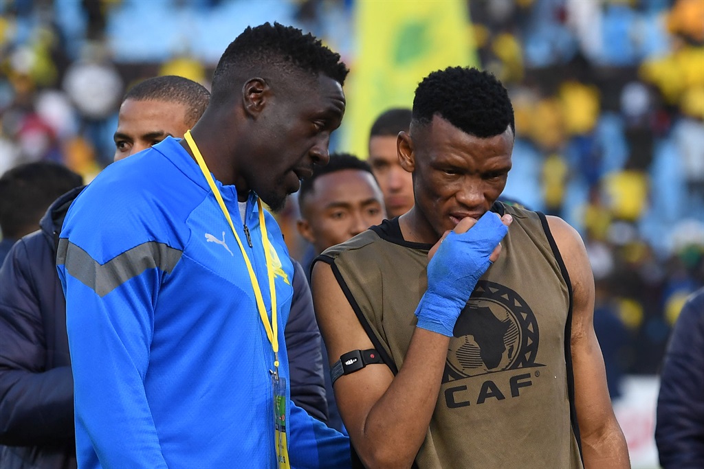 PRETORIA, SOUTH AFRICA - MAY 20: Brian Mandela Onyango and Mothobi Mvala looks dejected during the CAF Champions League match between Mamelodi Sundowns and Wydad Athletic Club at Loftus Stadium on May 20, 2023 in Pretoria, South Africa. (Photo by Lefty Shivambu/Gallo Images)