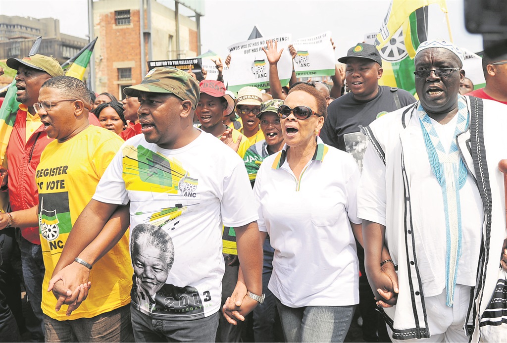 From left: Fikile Mbalula, Mzwandile Masina and Limpho Hani marched with other ANC members and traditional leaders to the Constitutional Court over the imminent release of Janusz Walus.                        Photo by Jabu Kumalo 