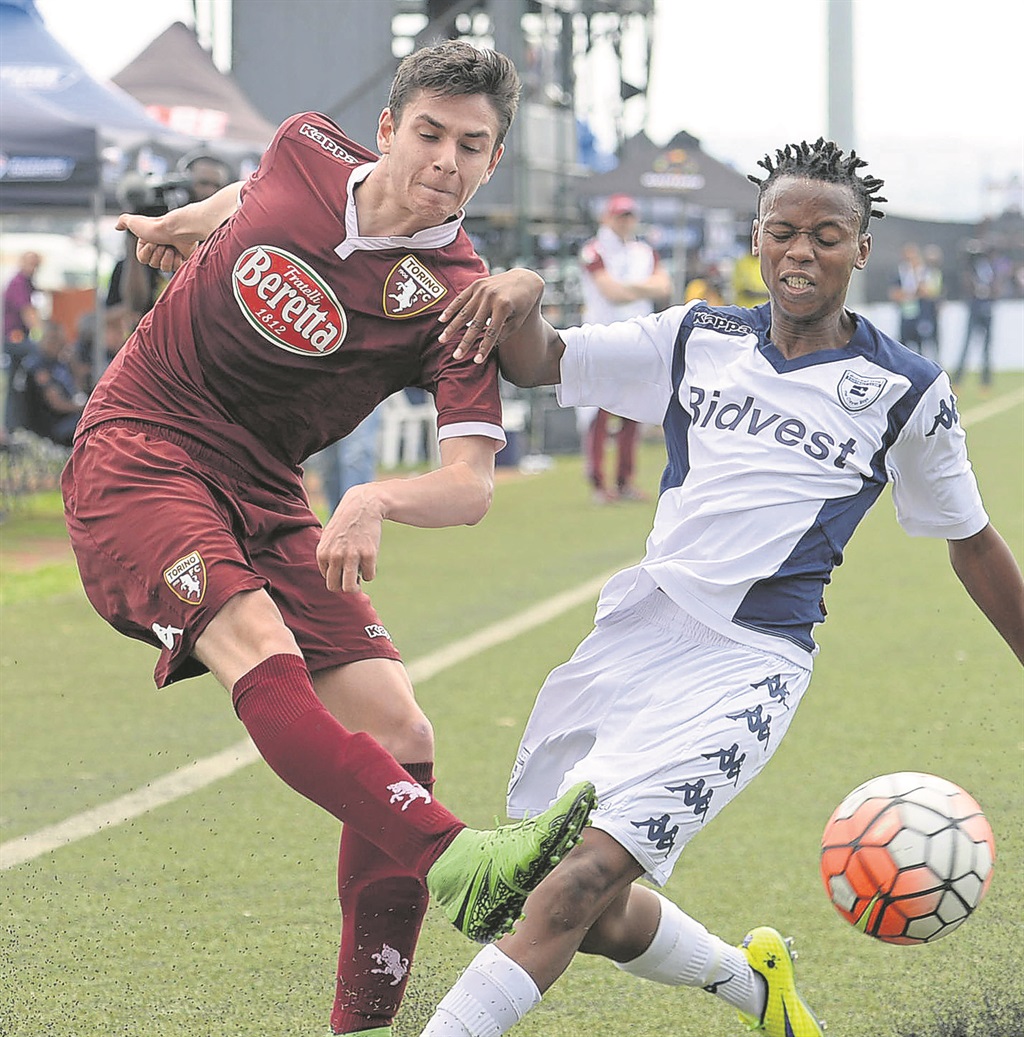 Torino FC’s Fiordaliso Alessandro (left) and Karabo Modibedi of Bidvest Wits fight for the ball during their Future Champions International match yesterday. Photo by Trevor Kunene 
