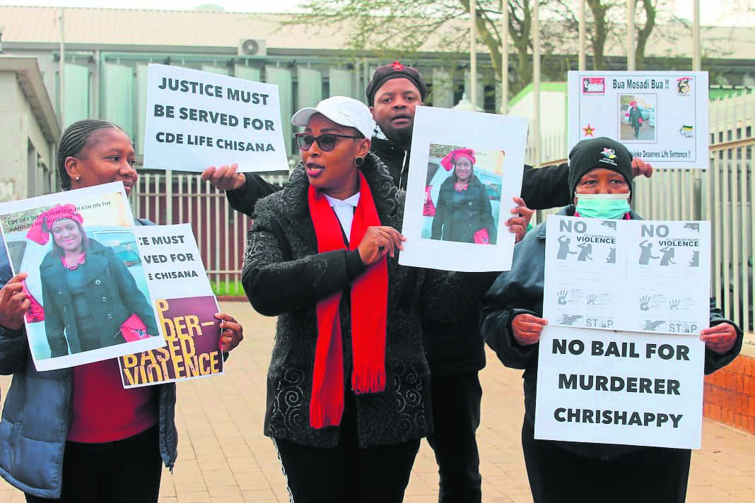 Members of the South African Commercial Catering and Allied Workers Union demonstrating outside the Atteridgeville Magistrates Court, where the husband of Life Rirhandzu Shisana, who allegedly murdered her, appeared.            Photo by Thokozile Mnguni