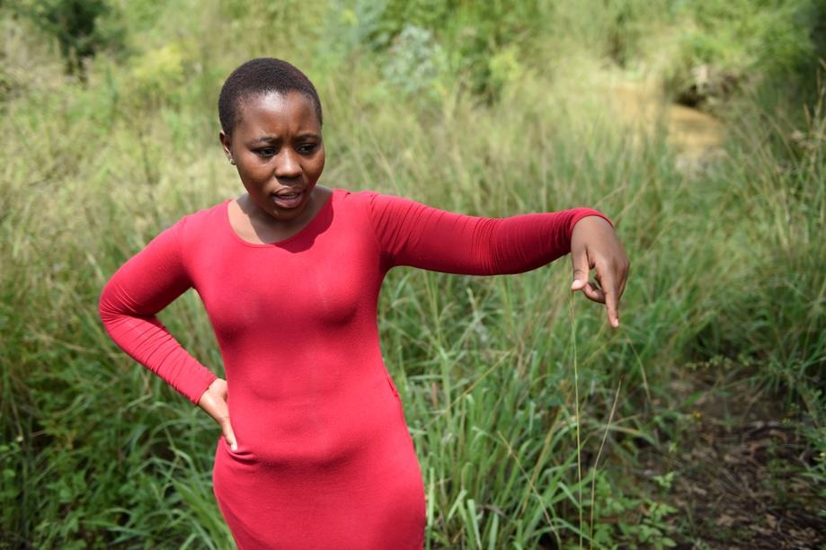 Neo Moeti shows where a church prophet ran off with her car. Photo by Lucky Maibi
