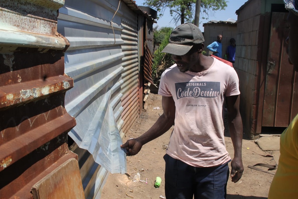 Moses Mthimunye said his neighbours allegedly broke into his business and stole from him. Photo by Phineas Khoza