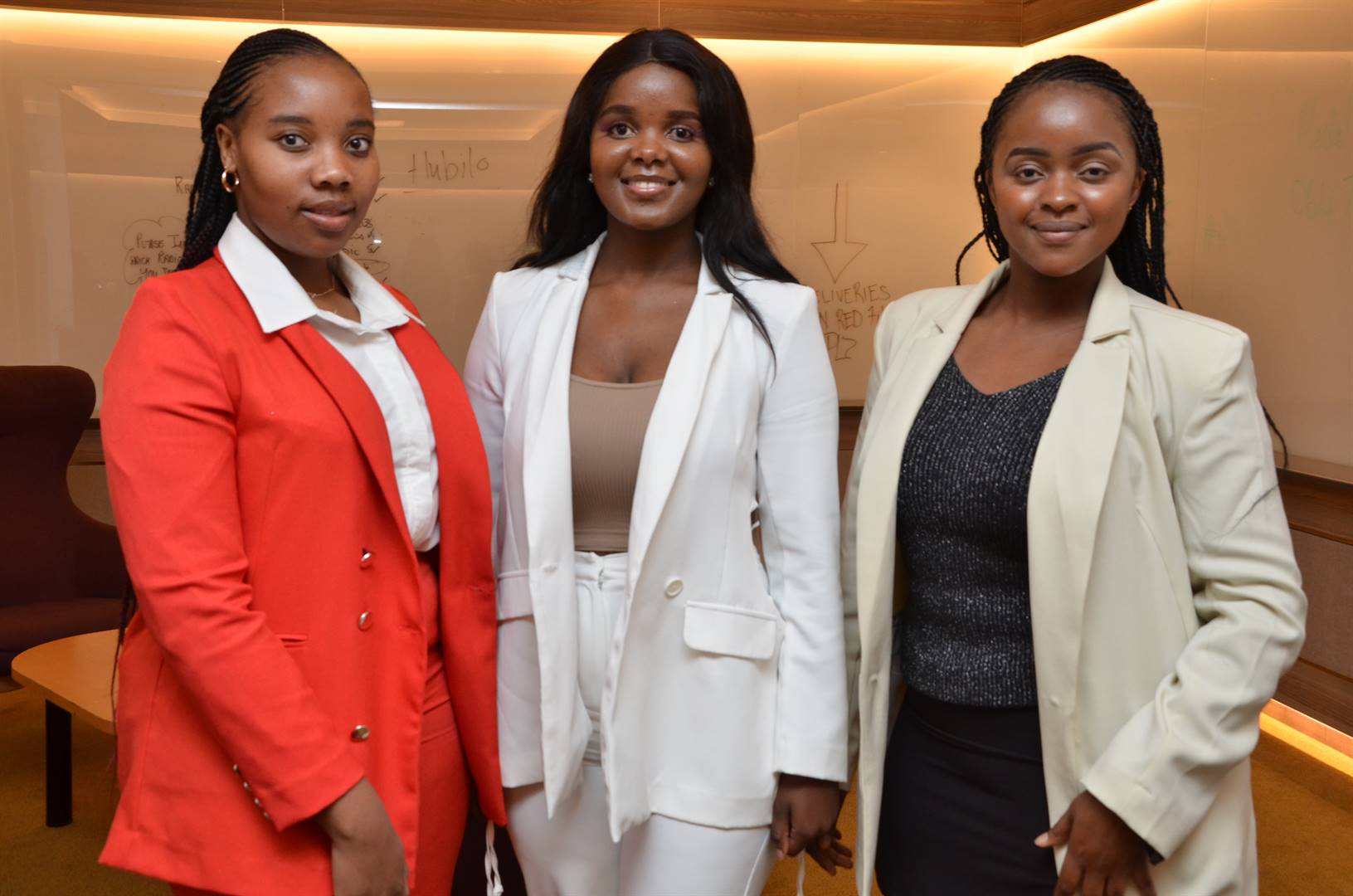 Thenjiwe Mathunjwa, Andile Sibiya and Tebogo Kabe have received bursaries from AWCA to pursue their studies in accounting. Photo by Rapulana Mancai 