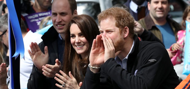 Prince William, Kate Middleton and Prince Harry support runners of the London Marathon. (Photo: Getty Images)