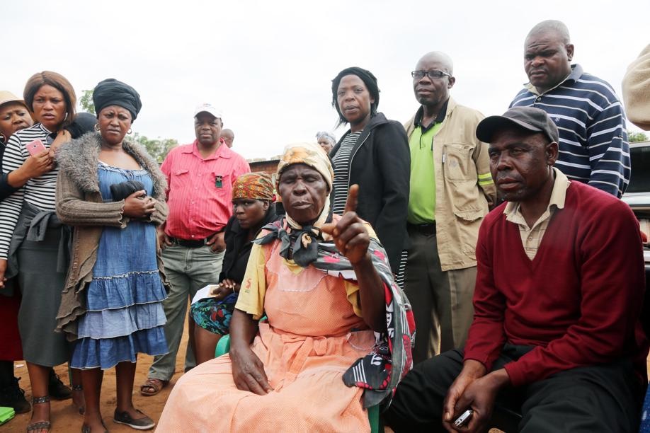 Gogo Maria Mashaba (seated) with her family, who were shocked when they insisted on opening Charles Mashaba’s coffin. Photo by
Joshua Sebola 
