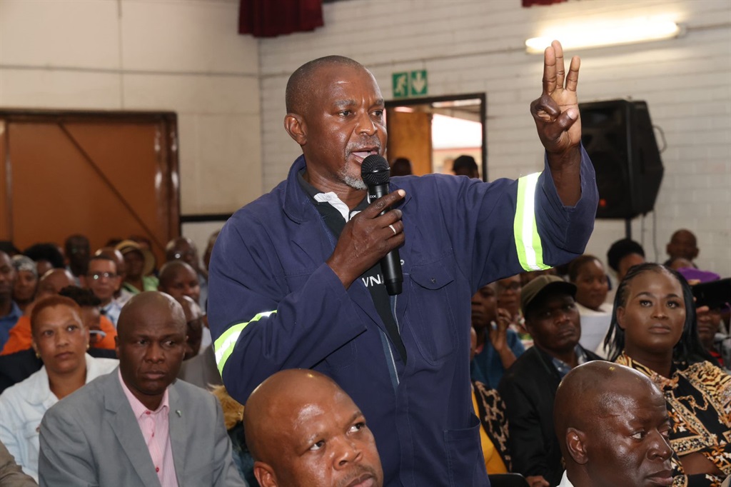 A parent speaking at the launch of Operation Kgutla Molao Sizwe Secondary School in Elandsfontein, Ekurhuleni.